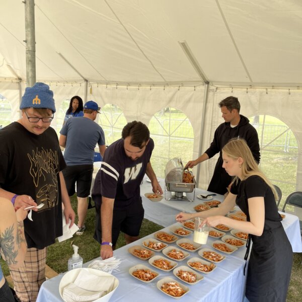 Participants grabbing their meals from the food tent.