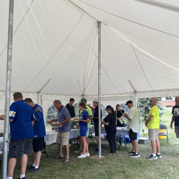 Participants grabbing their meals from the food tent.