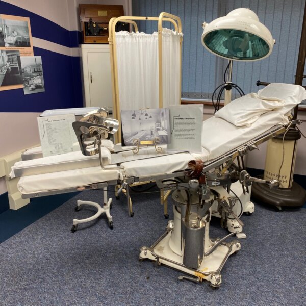 An image depicting an old operating table.