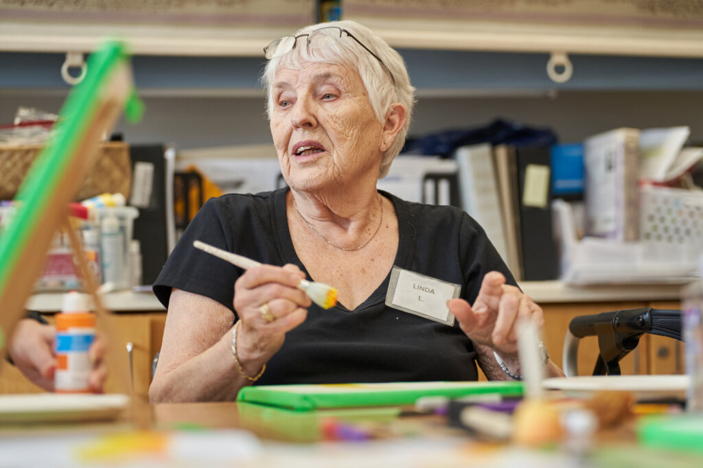 Linda painting at the Day Hospital